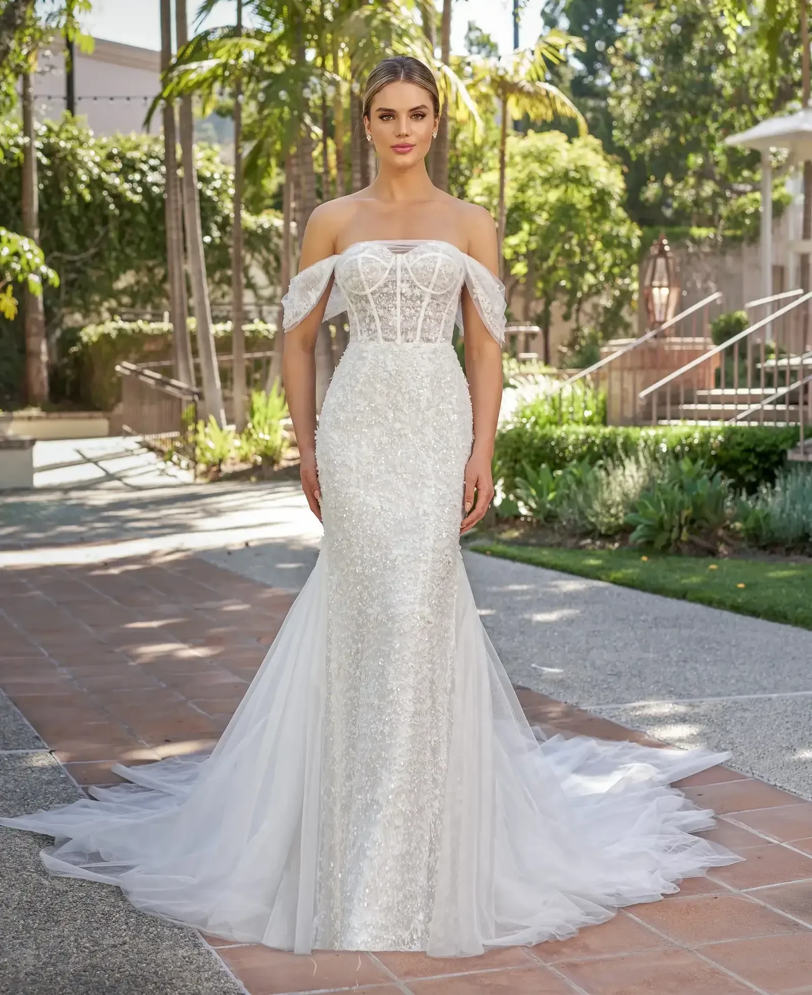 Model wearing a gown by Jasmine
