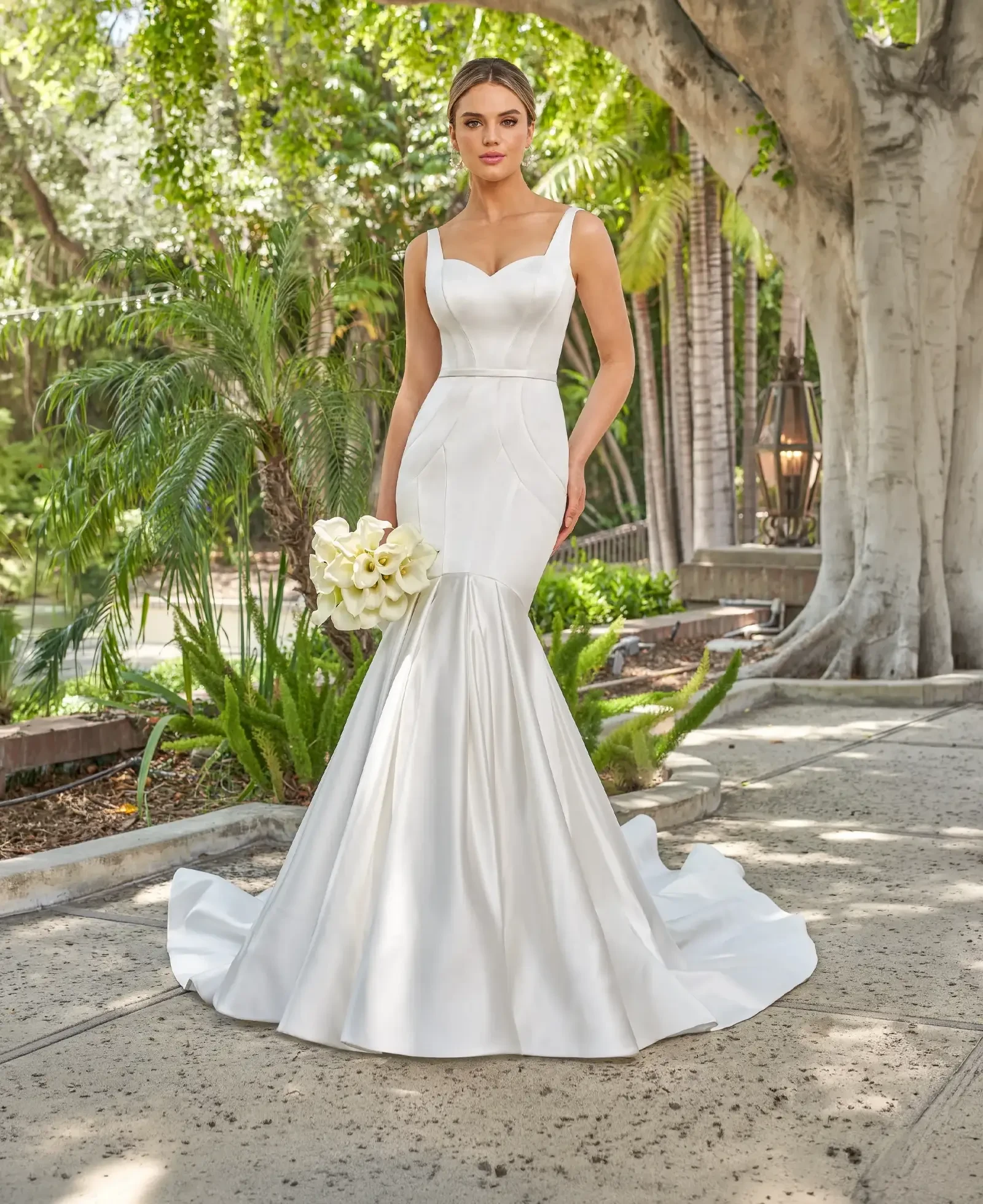 Model wearing a gown by Jasmine