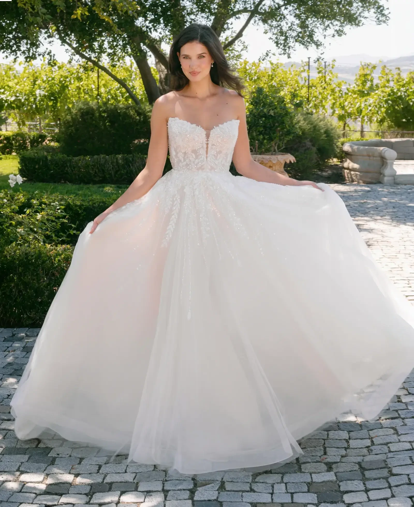 Model wearing a gown by Allure Bridals