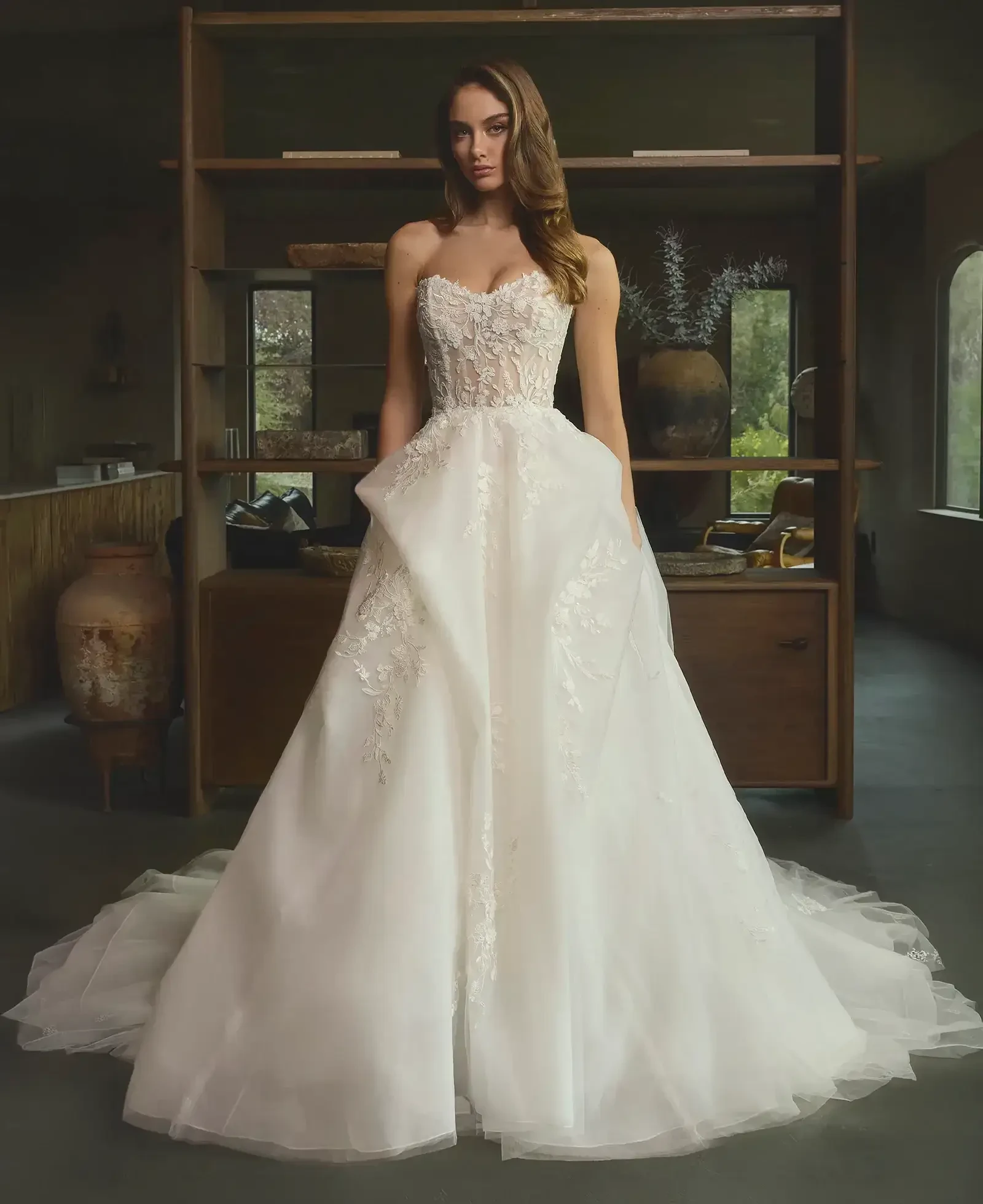 Model wearing a gown by Casablanca Bridal