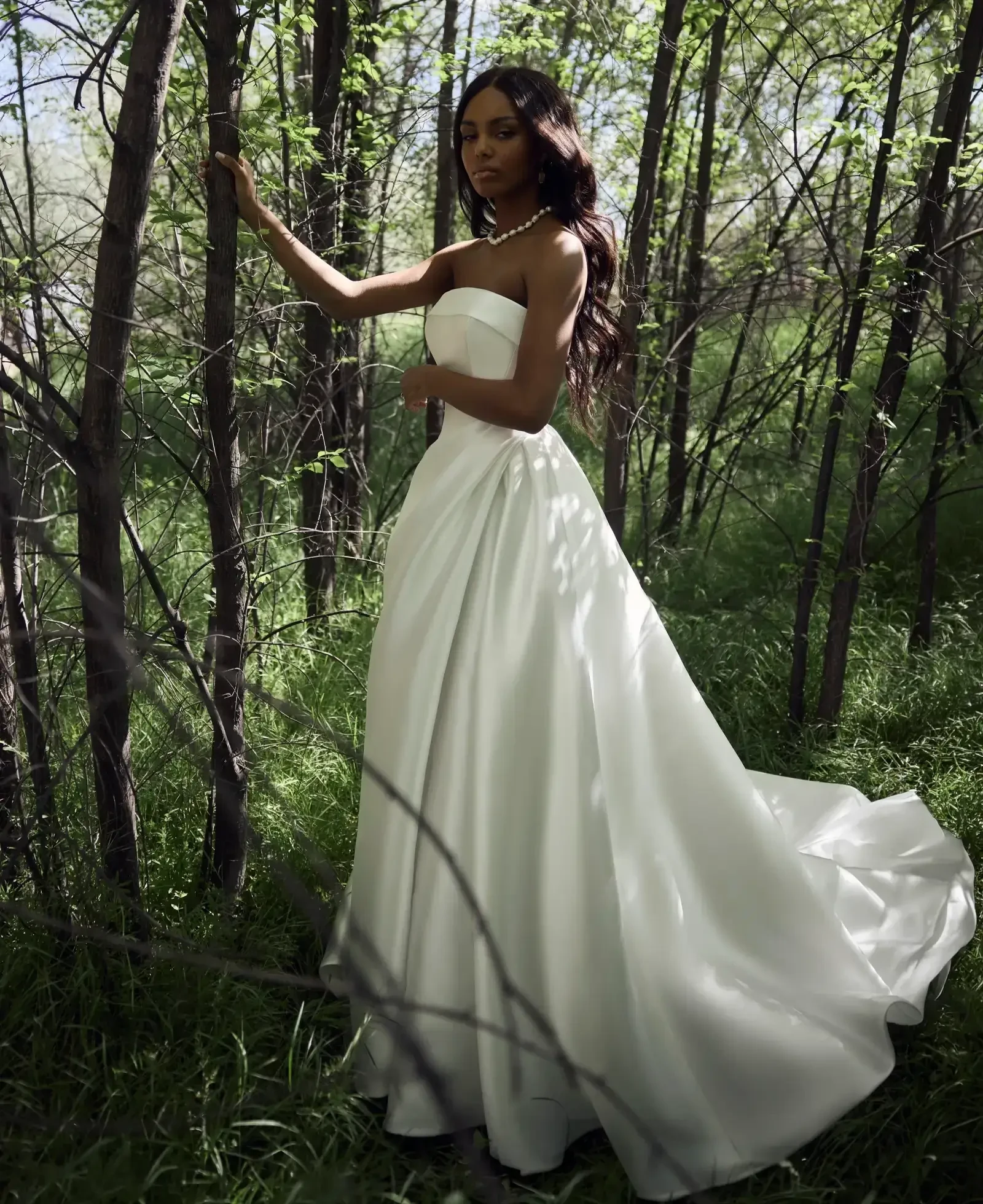Model wearing a gown by Rebecca Ingram