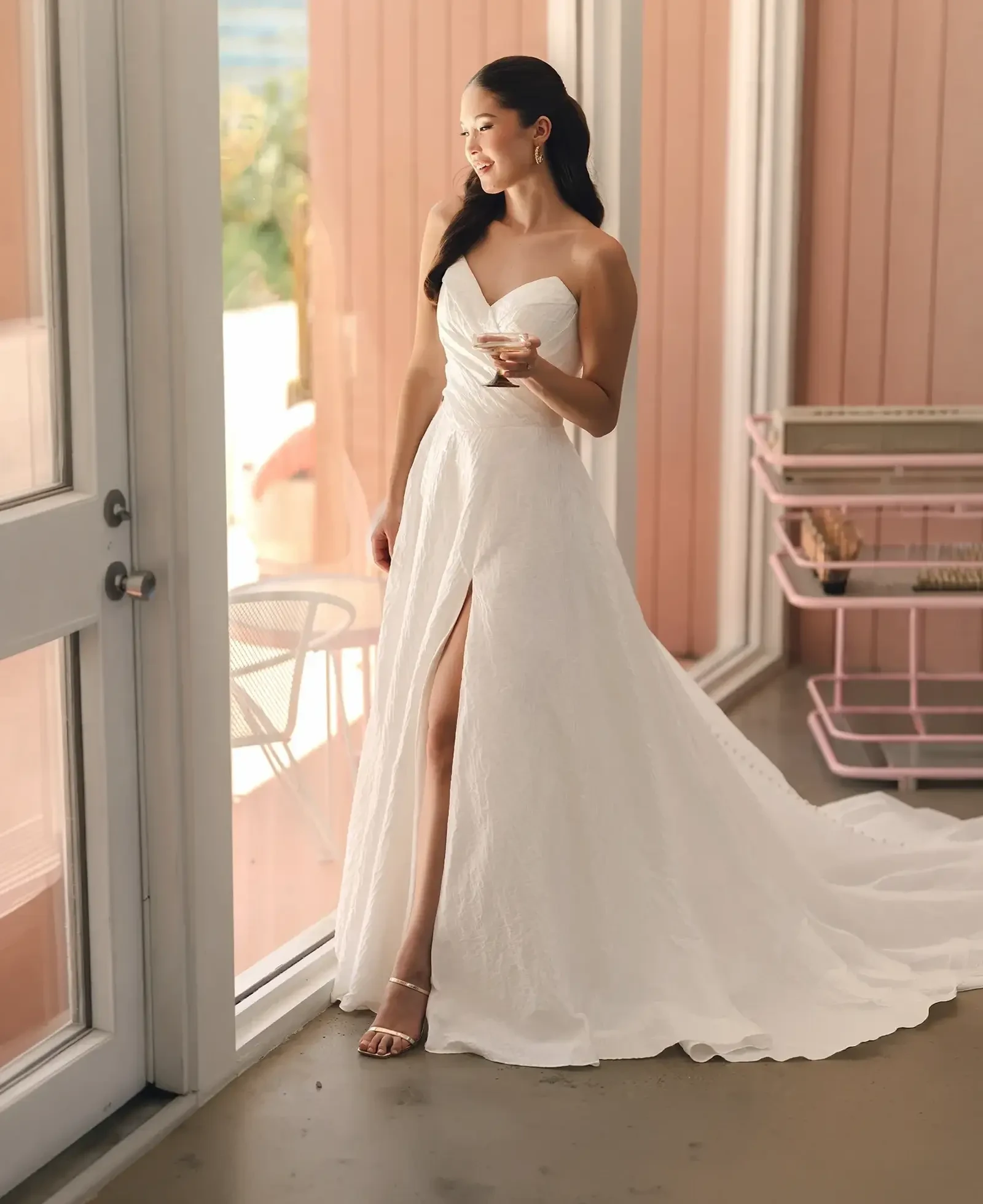 Model wearing a gown by Stella York