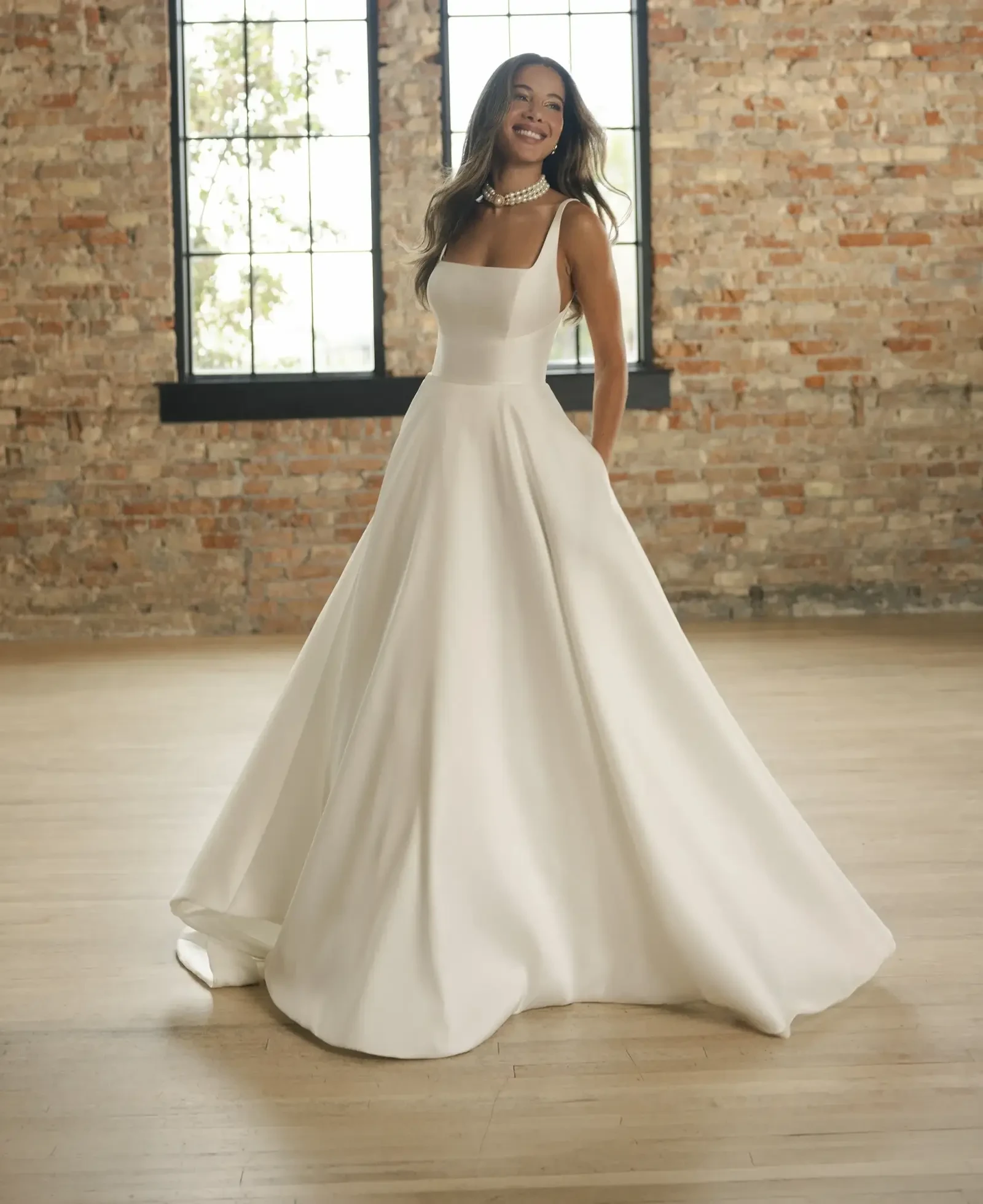 Model wearing a gown by Maggie Sottero