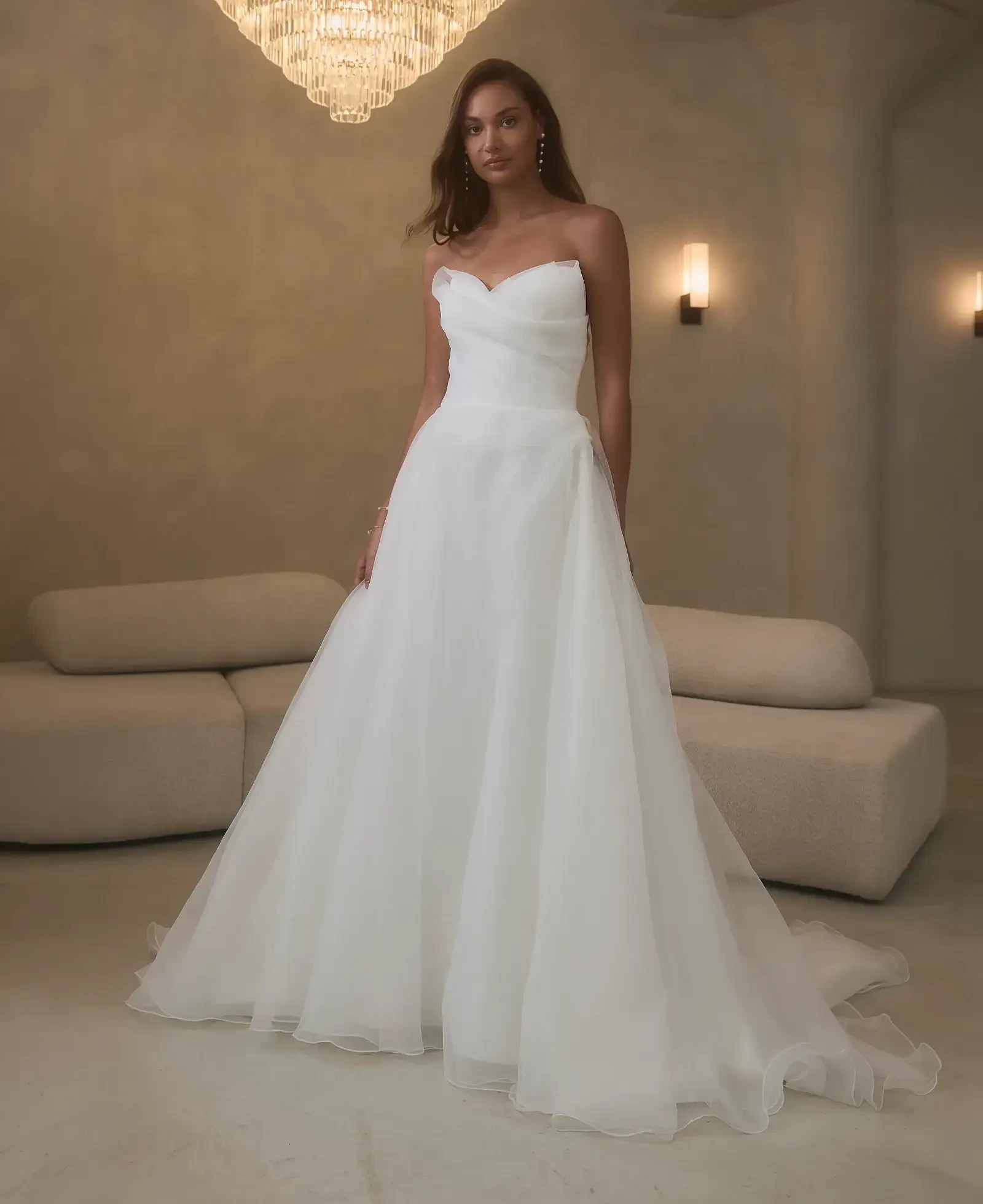 Model wearing a gown by Casablanca Bridal