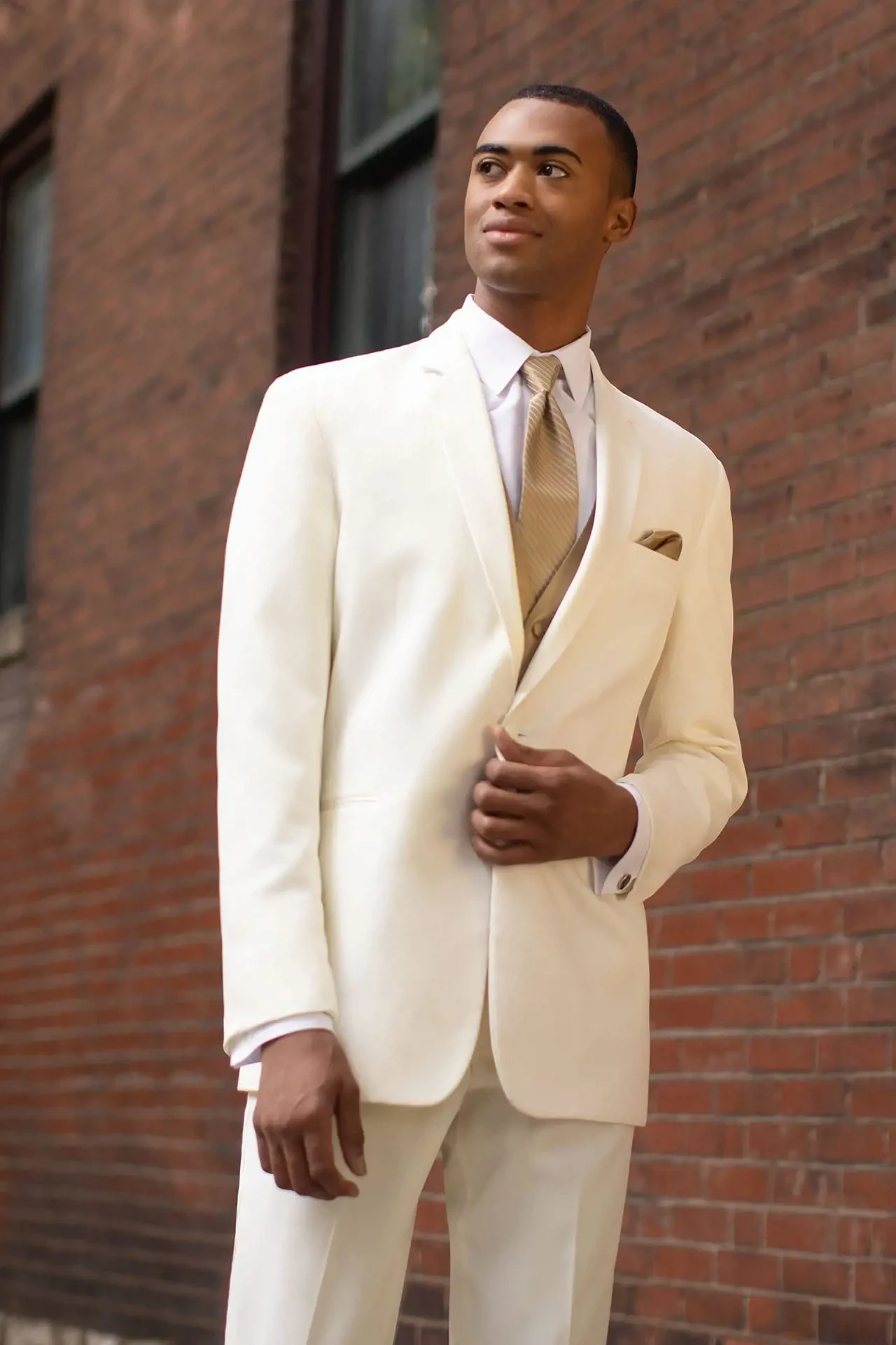 Model wearing a white suit
